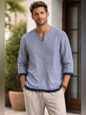 UNTUCKit Light Blue Top with dark Trim
100% Linen
3/4 sleeve
Men’s, size 8